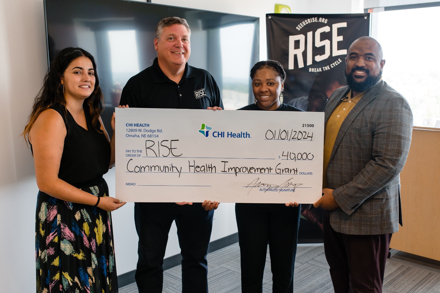CHI Health Gives $450K in Community Improvement Grants Group photo of check presentation to In Common