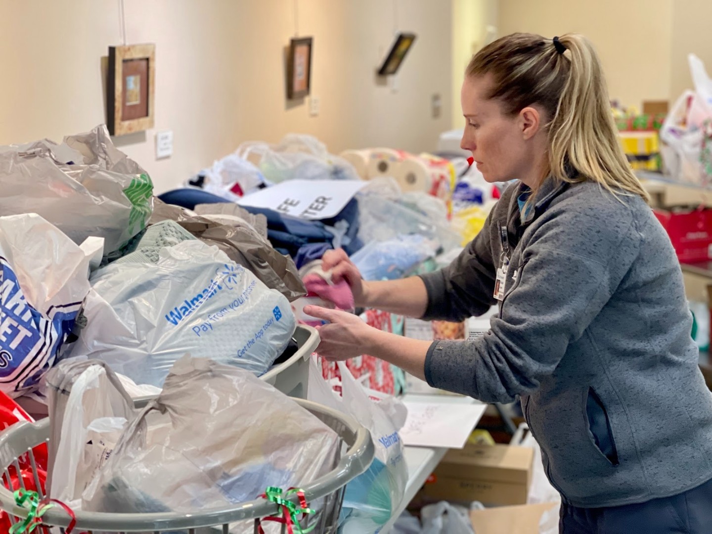 Employees sorting donations for the christmas donation drive
