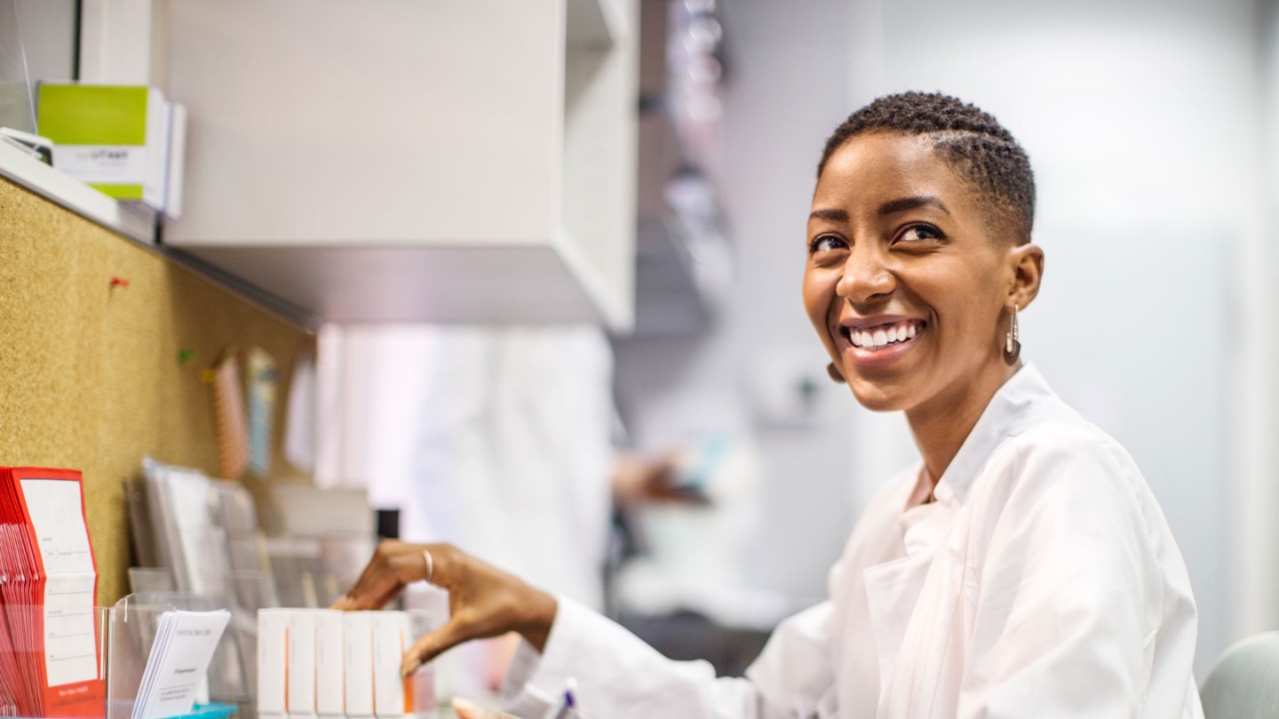 Smiling female pharmacist