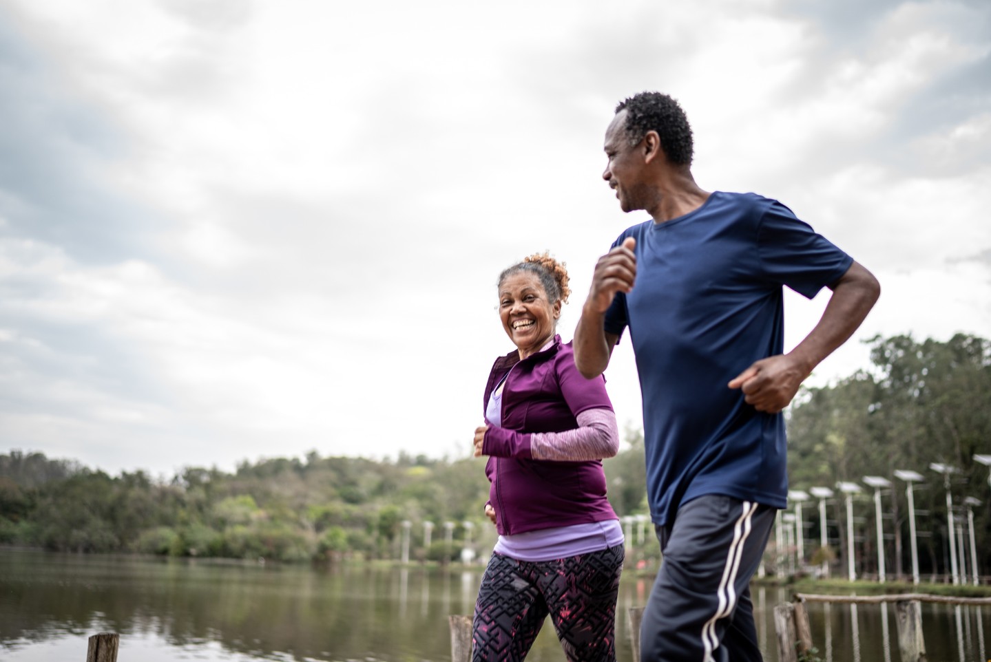 Senior couple jogging outdoors