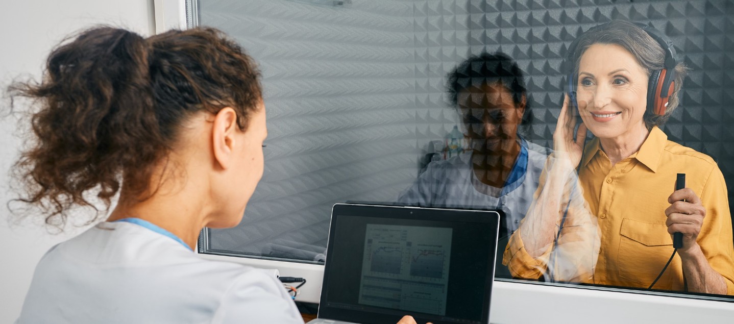 Older woman getting a hearing test