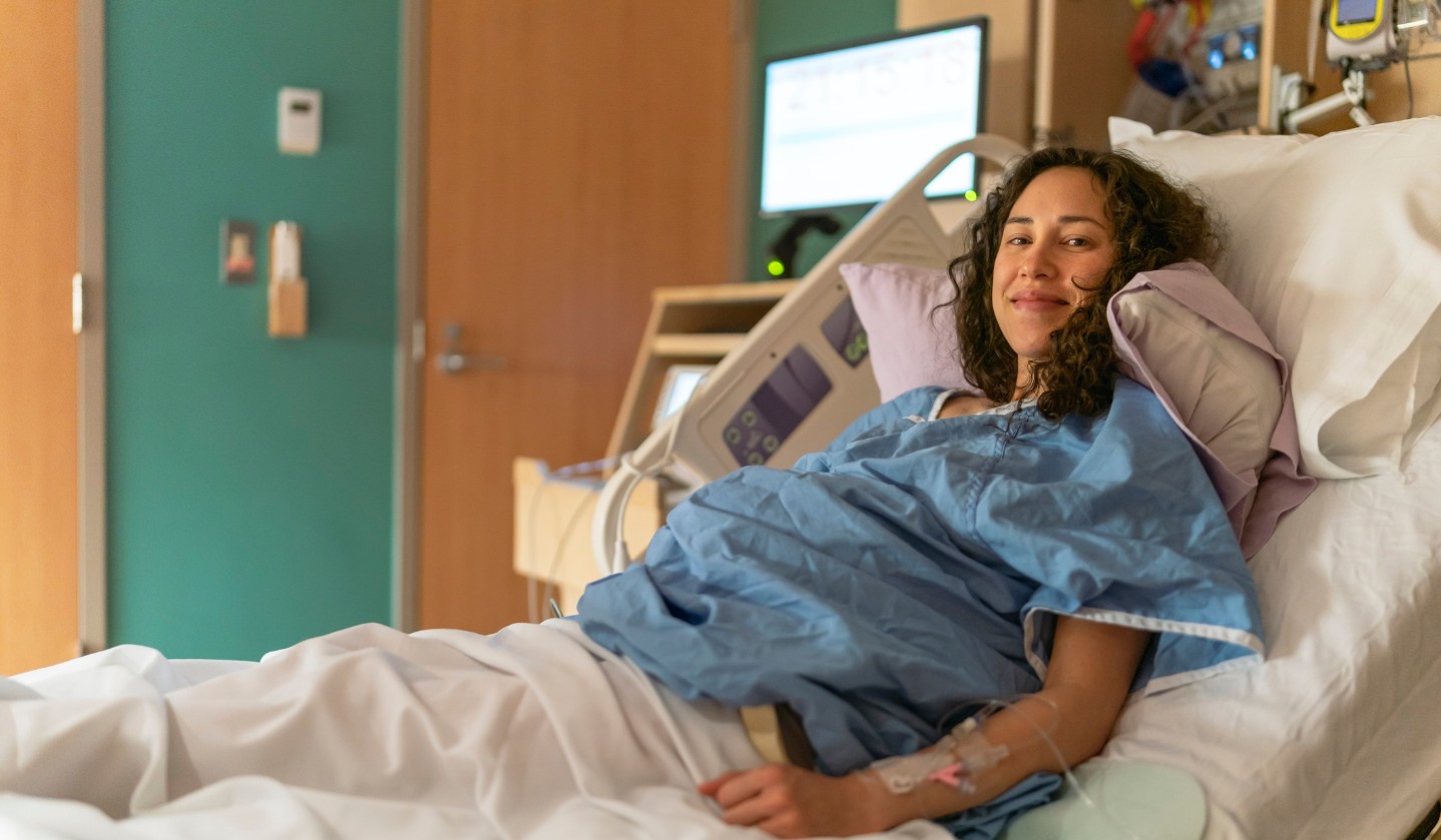 Woman ready to give birth in a hospital bed