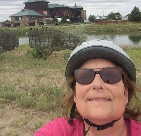 Orthopedic Patient Testimonials Carol Herron on a bike
