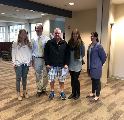 Orthopedic Patient Testimonials Alan Rager with Dr. Wright and group of staff