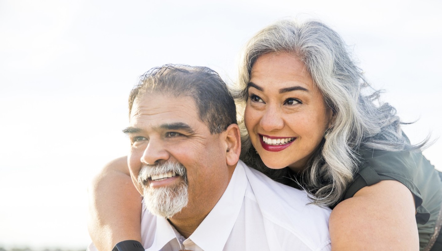 overweight couple smiling